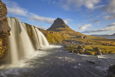 One of Iceland's iconic landscapes, Mount Kirkjufell and Kirkjufellsfoss Falls, near Grundarfjordur, Snaefellsnes peninsula, Iceland, Polar Regions