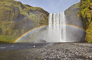 A permanent rainbow in waterfall spray, Skogafoss Falls, near Vik, southern Iceland, Polar Regions