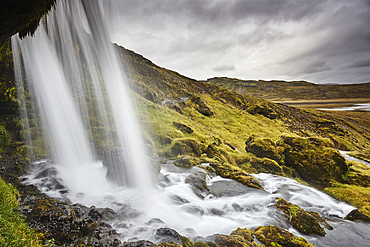 Hafrafell waterfall in mountains near the port of Stykkisholmur, Snaefellsnes peninsula, western Iceland, Polar Regions