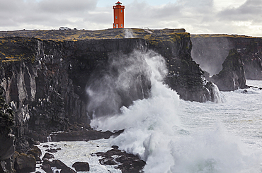 Storm surf against lava cliffs at Skalasnagi, in Snaefellsjokull National Park, the northwestern tip of the Snaefellsnes peninsula, on the west coast of Iceland, Polar Regions