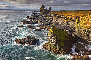 Morning sunlight on the rocks of Londranger, Snaefellsjokull National Park, close to the western tip of the Snaefellsnes peninsula, west coast of Iceland, Polar Regions