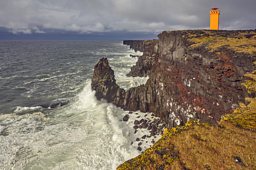 Storm surf against lava cliffs at Skalasnagi, in Snaefellsjokull National Park, the northwestern tip of the Snaefellsnes peninsula, on the west coast of Iceland, Polar Regions