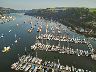 An aerial view of the estuary of the River Dart, with the towns of Dartmouth on the left and Kingswear on the right, on the south coast of Devon, England, United Kingdom, Europe