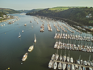 An aerial view of the estuary of the River Dart, with the towns of Dartmouth on the left and Kingswear on the right, south coast of Devon, England, United Kingdom, Europe