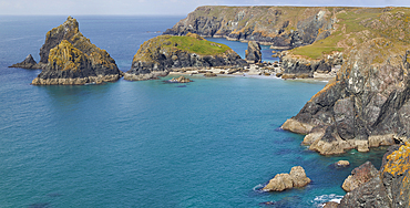 The stunning beach, rocks and cliffs at Kynance Cove, seen at at low tide, near the Lizard Point, Cornwall, England, United Kingdom, Europe