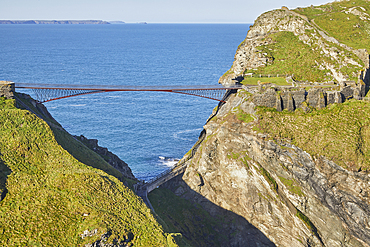 An aerial view of the dramatic ruins of Tintagel Castle, said to be the birthplace of King Arthur, on a rocky island off the shore, near the town of Tintagel, Cornwall, England, United Kingdom, Europe