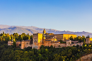 View of Alhambra, UNESCO World Heritage Site, and Sierra Nevada mountains, Granada, Andalucia, Spain, Europe