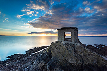 The old defences at Brean Down Fort, Brean Down, with Bristol Channel and Steep Holm Island in far distance, at sunset, Somerset, England, United Kingdom, Europe