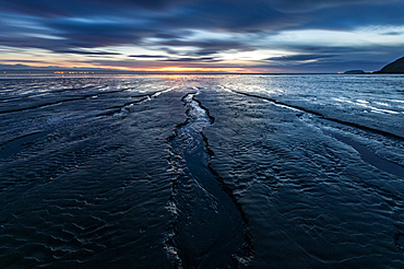 Brean Beach, mud and the Bristol Channel at sunset, Somerset, England, United Kingdom, Europe