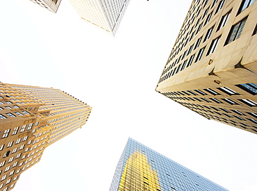 Looking up through New York skyscrapers, New York, United States of America, North America