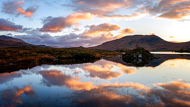 Sunset view across Lochain na h'achlaise at dawn, Rannoch Moor, Highland, Scotland, United Kingdom, Europe