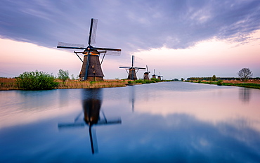 Windmills and reflections, Kinderdijk, UNESCO World Heritage Site, The Netherlands, Europe