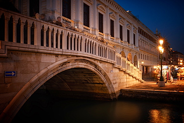 Ponte della Paglia bridge at night in Venice, Italy, Europe