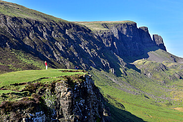 Tourists enjoying the beautiful views of the Quiraing, Isle of Skye, Inner Hebrides, Scotland, United Kingdom, Europe