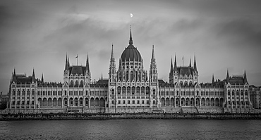 Hungarian Parliament with the moon above in black and white, Budapest, Hungary, Europe