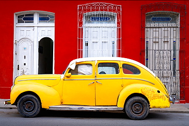 Old classic yellow car, Cienfuegos, Cuba, West Indies, Caribbean, Central America