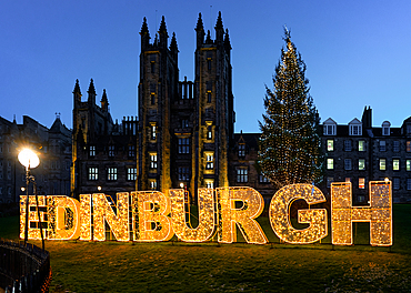 Edinburgh Christmas tree and sign in front of the New College, the Mound, Edinburgh, Scotland, UK