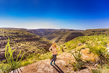 Woman in Desert Loop Trail in Carlsbad Caverns National Park, New Mexico, United States of America, North America