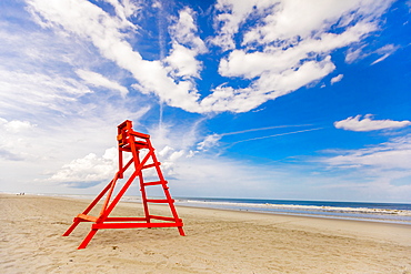 Empty lifeguard chair on empty Jacksonville beach during closing hours during Covid-19 pandemic, Florida, United States of America, North America