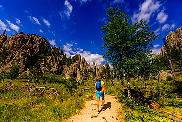 Man hiking the trails and enjoying the sights in the Black Hills of Keystone, South Dakota, United States of America, North America