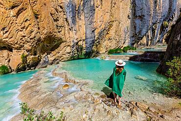 Woman taking in the Millpu Natural Pools, Ayacucho, Peru, South America