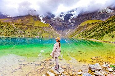 Woman trekking Humantay Lake, Cusco, Peru, South America