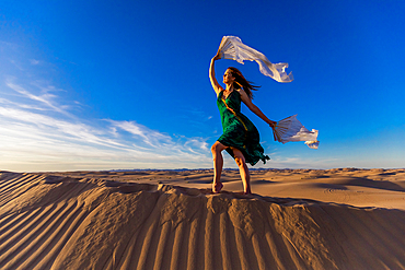 Ethereal woman at the Imperial Sand Dunes, California, United States of America, North America