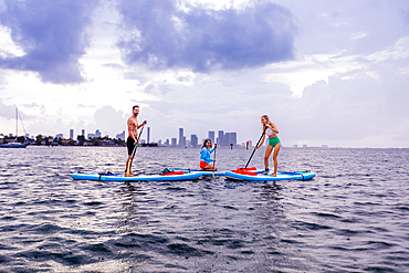 Paddleboarding off Miami Beach, Florida, United States of America, North America