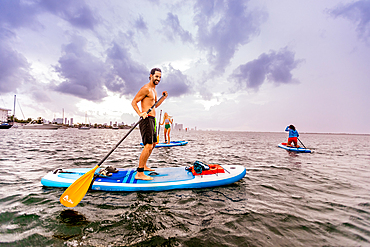 Paddleboarding off Miami Beach, Florida, United States of America, North America