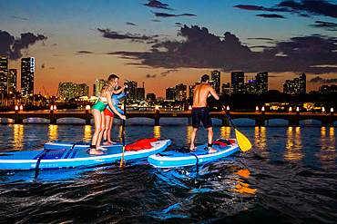 Paddleboarding off Miami Beach, Florida, United States of America, North America