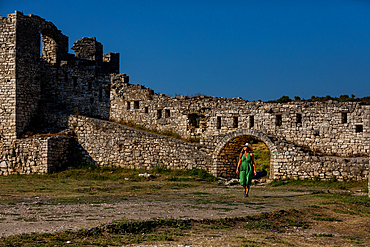 Woman at the ruins of Berat Castle, Berat, Albania, Europe