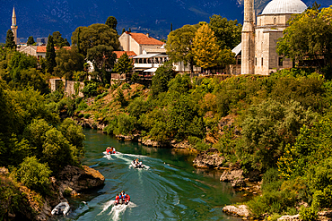 Boats along the Neretva River, Mostar, Bosnia and Herzegovina, Europe