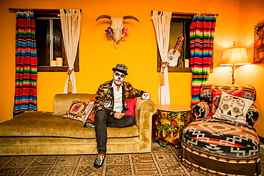 Man in Dia de los Muertos makeup and costume, Day of the Dead celebration in the desert, California, United States of America, North America