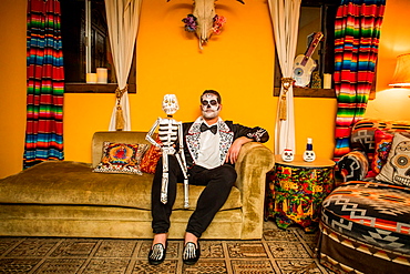 Man in Dia de los Muertos makeup and costume, Day of the Dead celebration in the desert, California, United States of America, North America