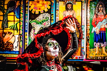 Woman in Dia de los Muertos makeup and costume, Day of the Dead celebration in the desert, California, United States of America, North America