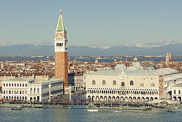 The Doge's Palace, Campanile, Bridge of Sighs and a flooded St. Mark's Square with gondolas lining the shore and Alps beyond, Venice, UNESCO World Heritage Site, Veneto, Italy, Europe