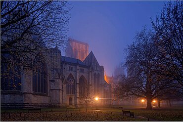 The Church and Metropolitical Church of Saint Peter, York Minster, shrouded in fog at dawn on a late autumn morning.