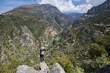 A man hiking in the Taygetos Mountains on the Mani Peninsula, Peloponnese, Greece, Europe