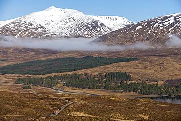 Hiking along The West Highland Way between Bridge of Orchy and Inveroran in the Scottish Highlands, Scotland, United Kingdom, Europe