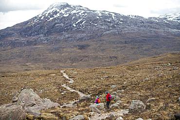 Hiking in the Scottish Highlands in Torridon along The Cape Wrath Trail towards Loch Coire Mhic Fhearchair, Highlands, Scotland, United Kingdom, Europe