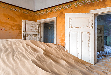 The interior of a building in the abandoned diamond mining ghost town of Kolmanskop, Namibia, Africa