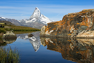 The Matterhorn reflected in Stellisee lake in the Swiss Alps, Switzerland, Europe