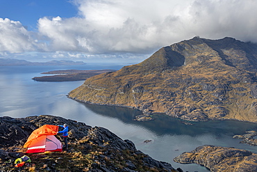 Wild camping on the top of Sgurr Na Stri looking towards Loch Coruisk and the main Cuillin ridge, Isle of Skye, Inner Hebrides, Scotland, United Kingdom, Europe