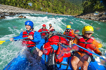 Rafting through white water rapids on the Karnali River in west Nepal, Asia