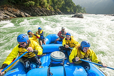 Rafters go through some rapids on the Trisuli River, Nepal, Asia