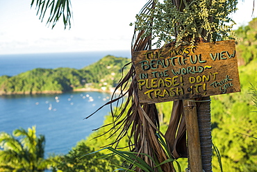 A sign asking readers not to trash the most beautiful view in the world at Castara Bay in Tobago, Trinidad and Tobago, West Indies, Caribbean, Central America