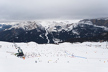 Skiers in the mountains, Dolomites, Italy, Europe