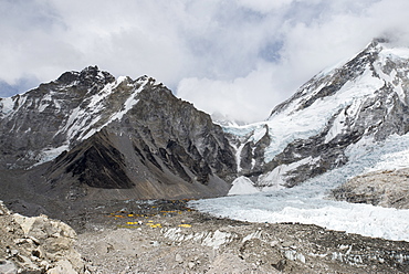 Everest Base Camp at 5350m seen here as a scattering of tents in the distance at the back of the Khumbu glacier, Khumbu Region, Nepal, Himalayas, Asia