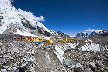 Tents at Everest Base Camp set up on the glacier among the boulders and holes in the ice, Khumbu Region, Nepal, Himalayas, Asia