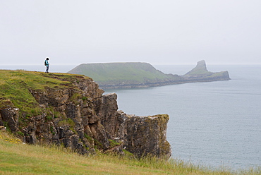 Looking towards Worms Head from Rhossili Bay on The Gower, South Wales, United Kingdom, Europe